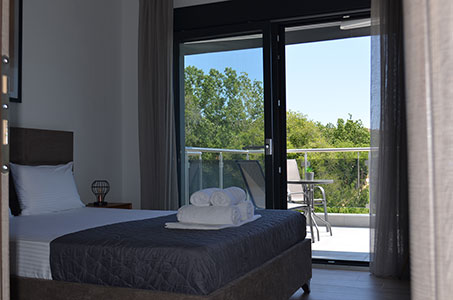 Master bedroom of Black Pearl house in Kalamitsi Halkidiki