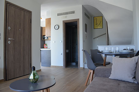 Living room and Kitchen at the back of Black Pearl house in Kalamitsi Halkidiki